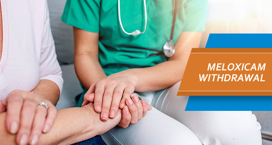 Doctor is consulting her patient about Meloxicam Withdrawal