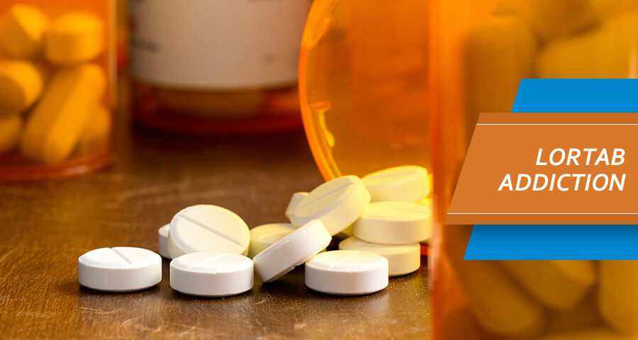Pills of Lortab spilled on the table