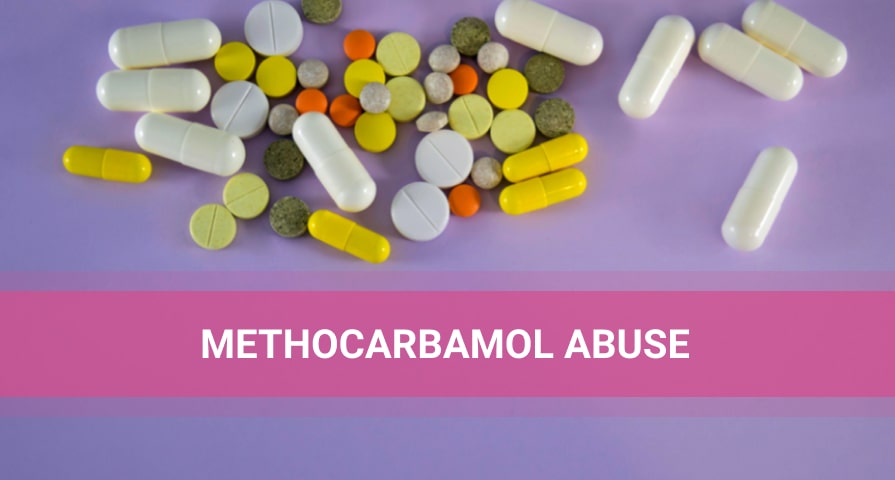 White, yellow and red pills on purple background