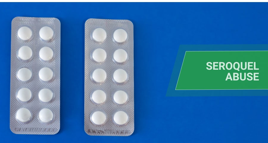 two blisters of pills on blue background