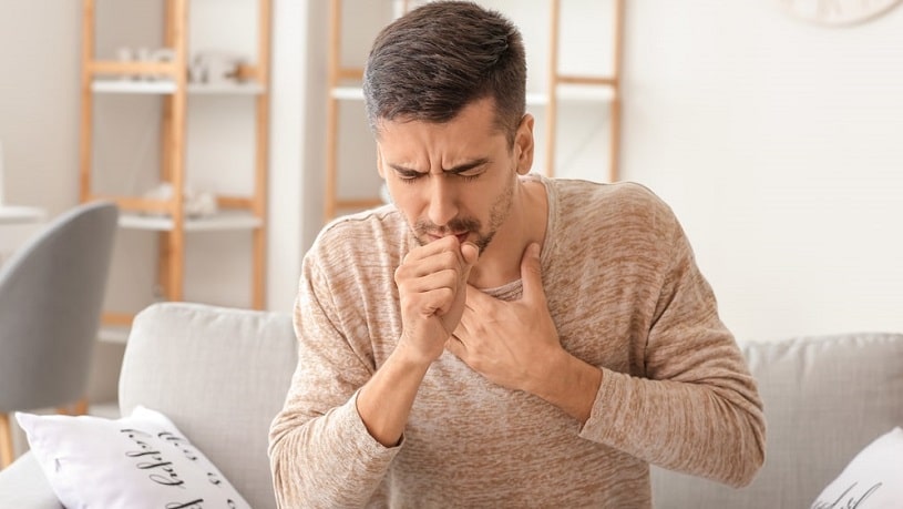 Coughing man.