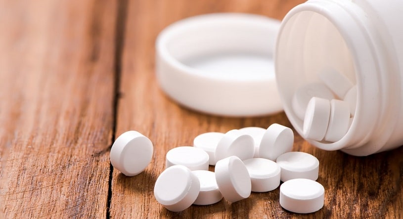 Hydrocodone acetaminophen pills on the table.