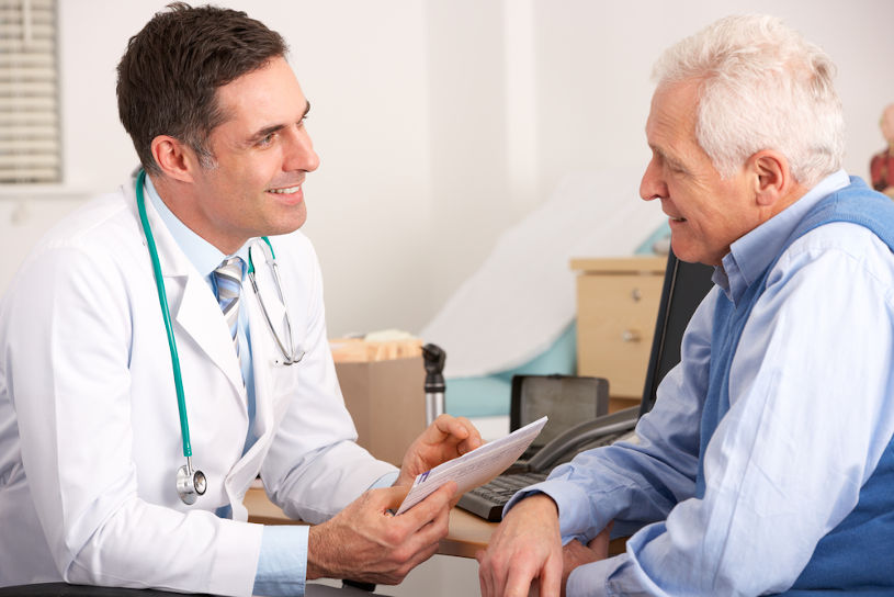 Doctor talking to the senior man.