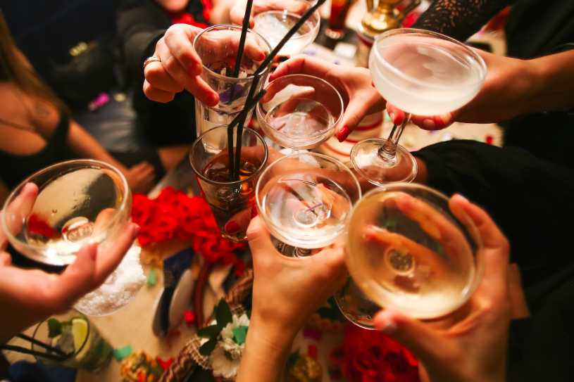 A group of young people drinking alcohol.