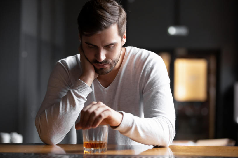 A man can't stop drinking alcohol.