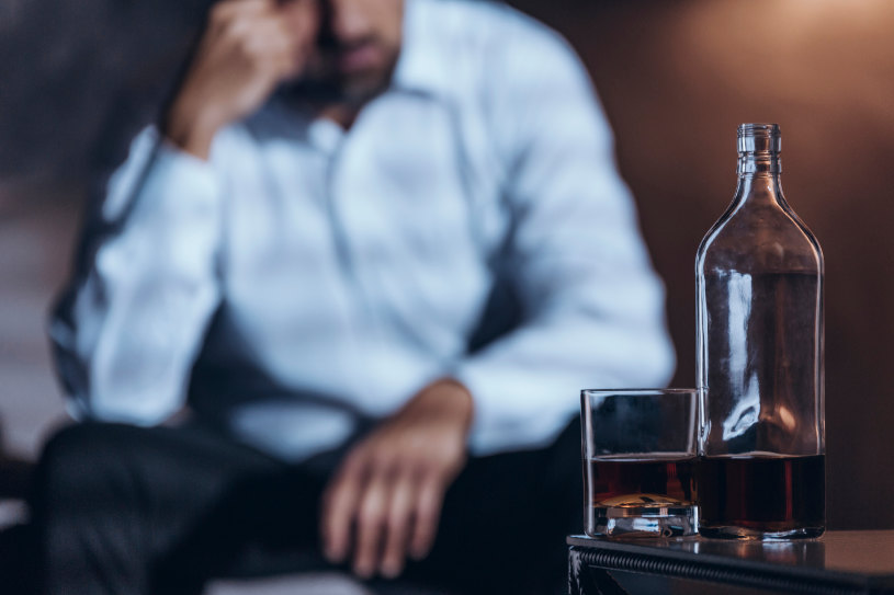 A man strugles alcohol dependence.