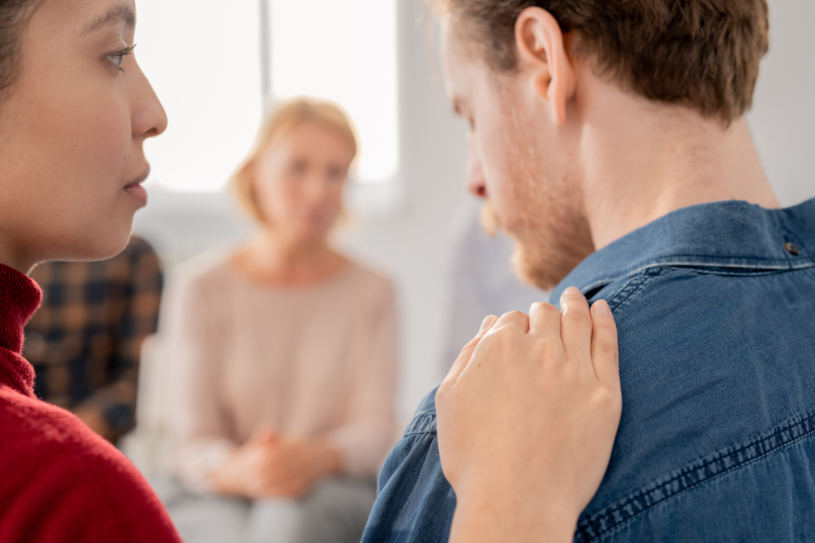 A woman supports her husband as he tries to stop drinking alcohol.