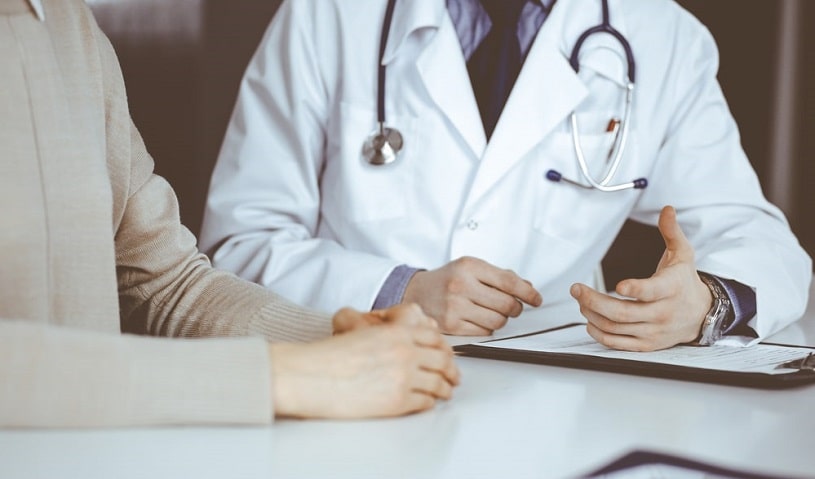 Doctor consulting a patient about weaning off effexor.