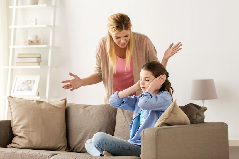 Woman crying at her daughter.