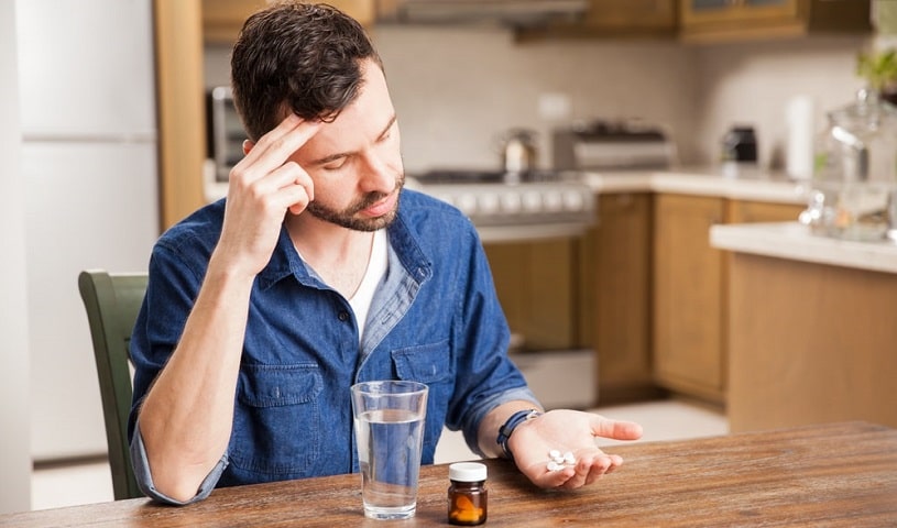 Young man taking Klonopin.
