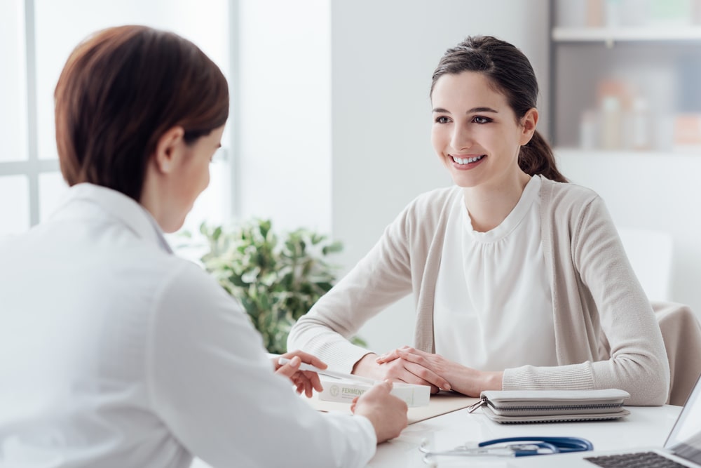 Patient discussing tapering off Prozac with the doctor.