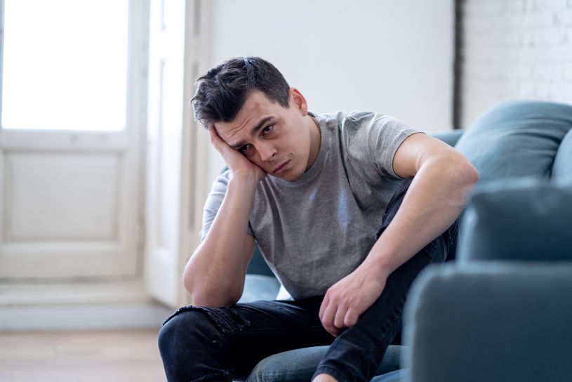 Young man felling depressed without alcohol.