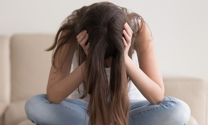 Depressed woman suffering from Clonidine abuse.