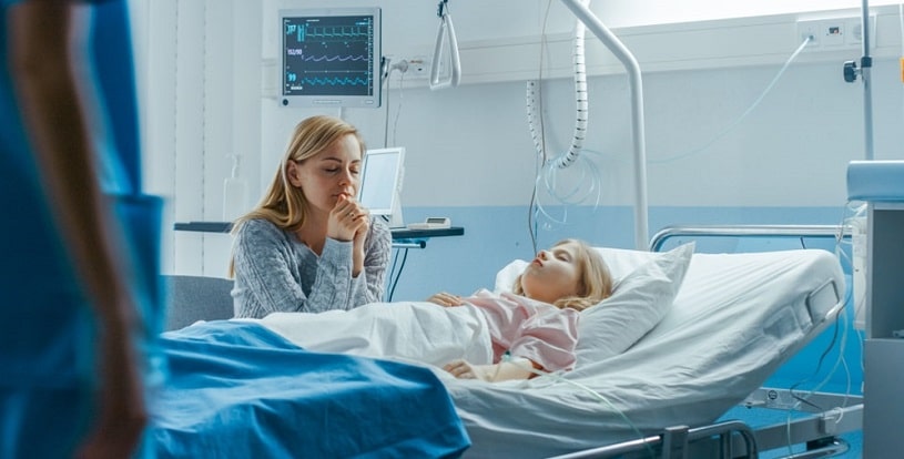 Little girl lying in the hospital after clonidine overdose.