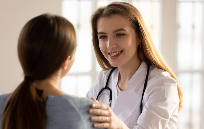 Doctor congratulating her patient.