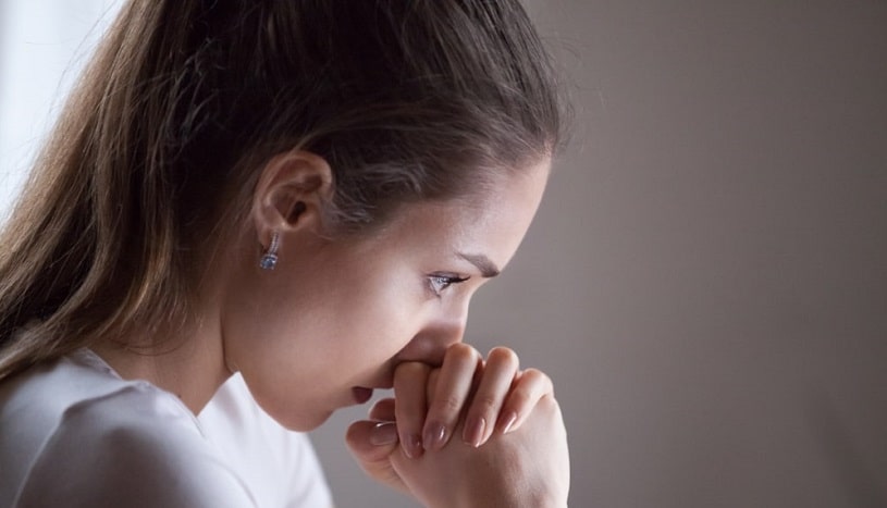 Depressed woman suffering from Soma withdrawal.