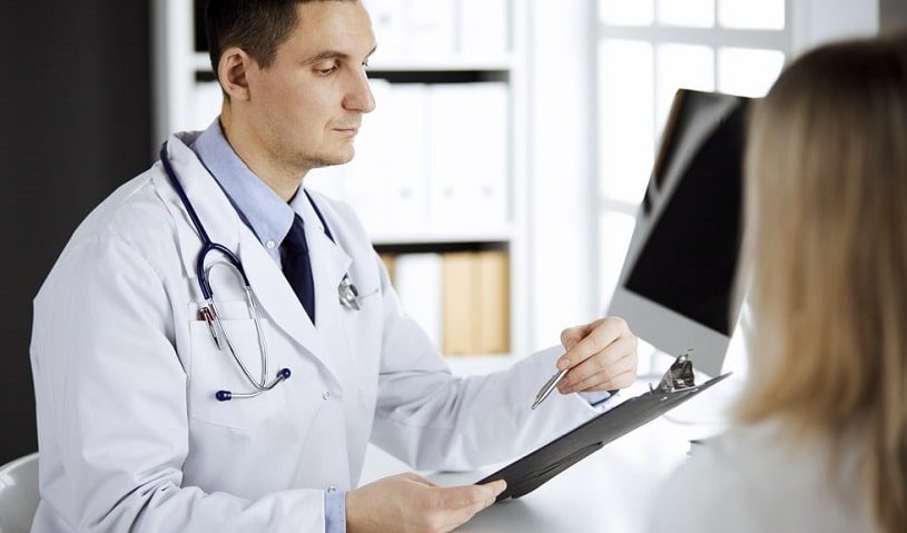 Patient talking to a doctor about Carisoprodol side effects she is experiencing.