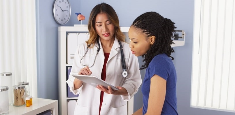 Doctor talking to a patient about Meloxicam uses.