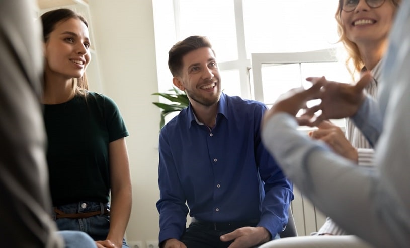 Group of people at a SMART recovery meeting.