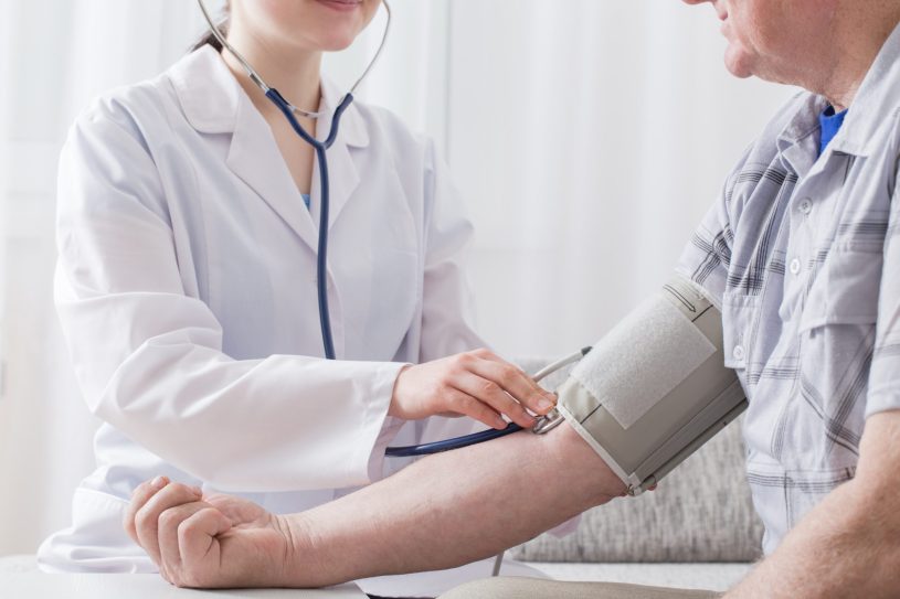 Doctor is measuring blood pressure