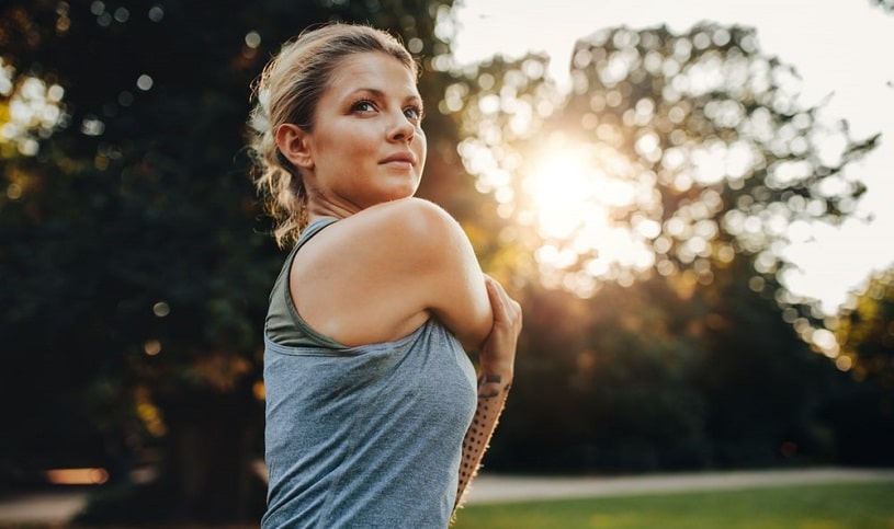 Woman feeling a rush of energy after NAD IV therapy.