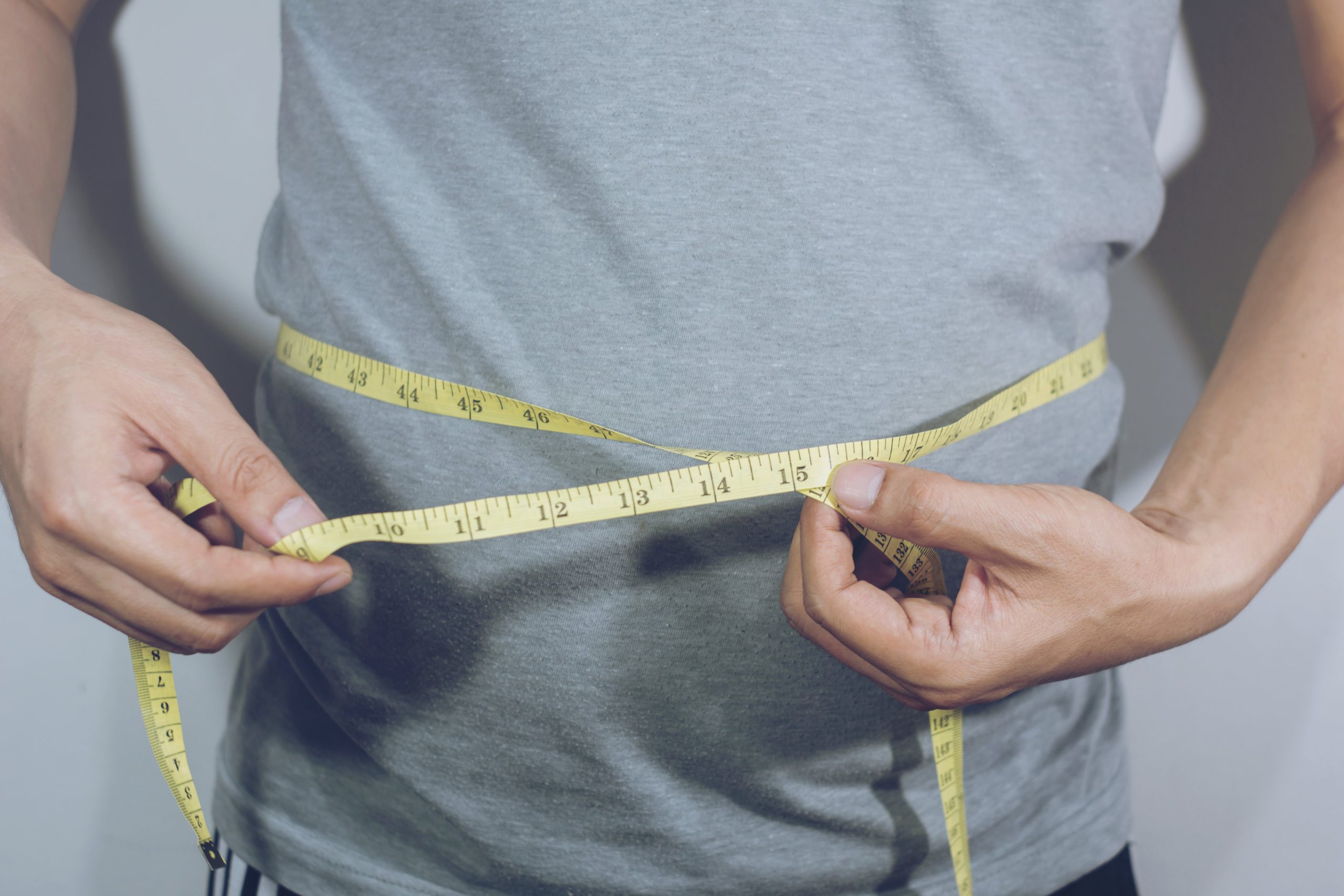 Man with measuring tape