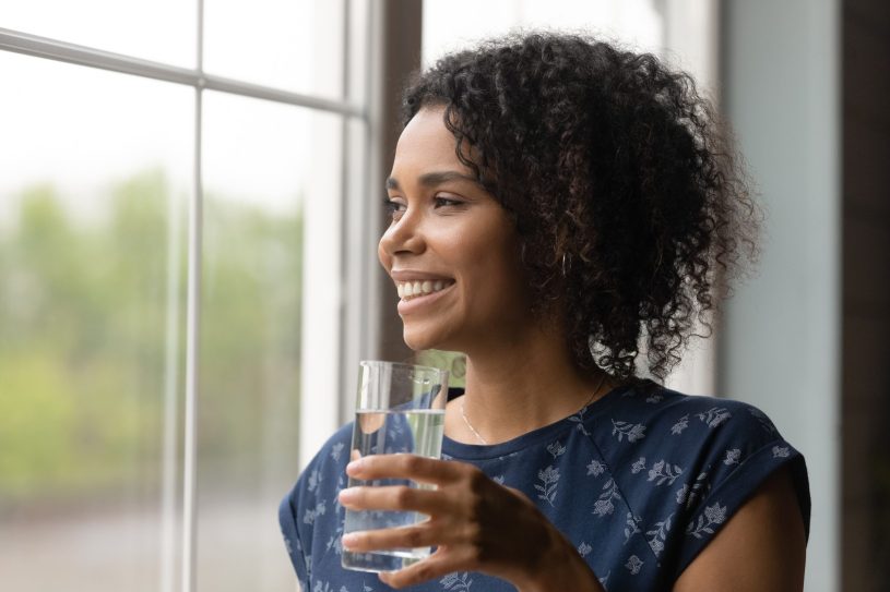 Woman with the glass of water