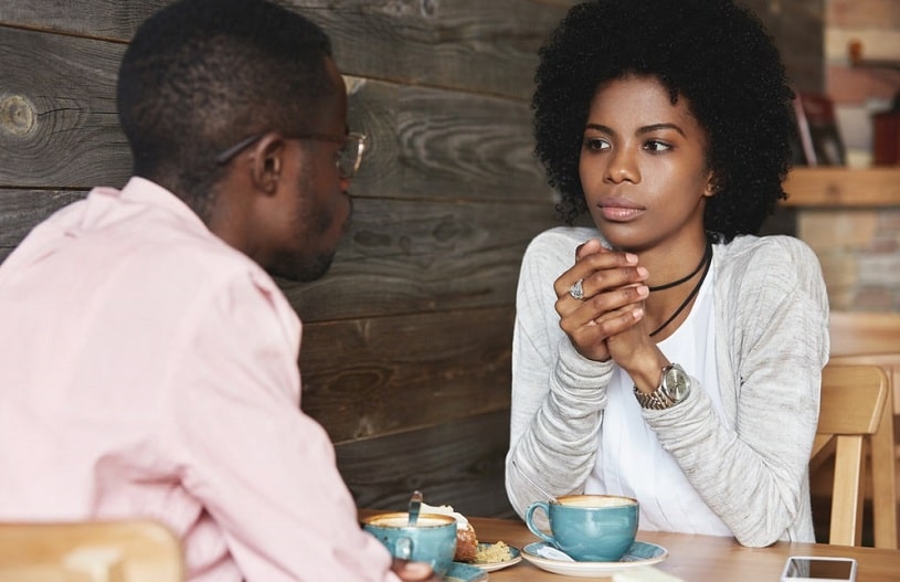 Counselor talking to a drug addict.