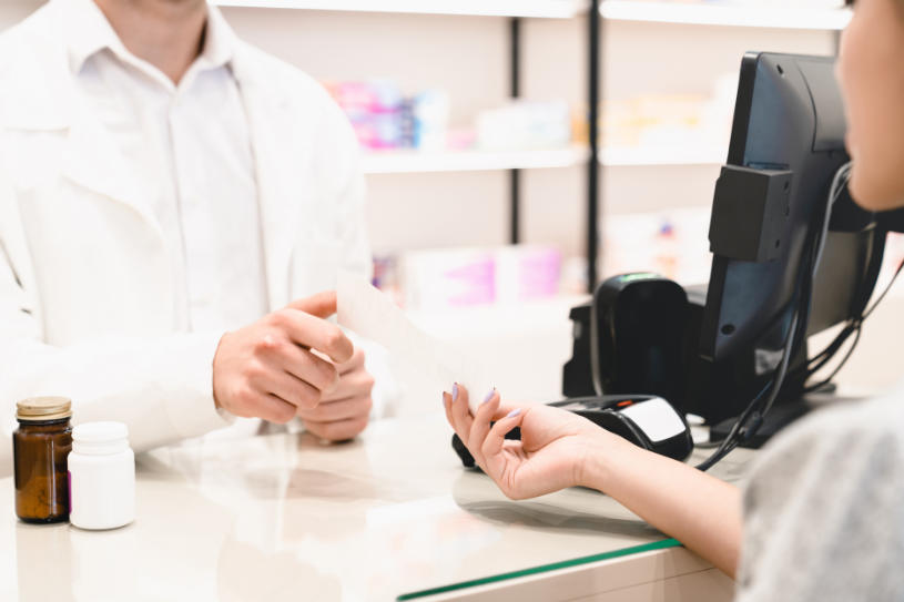 A doctor gives antidepressants to a patient.